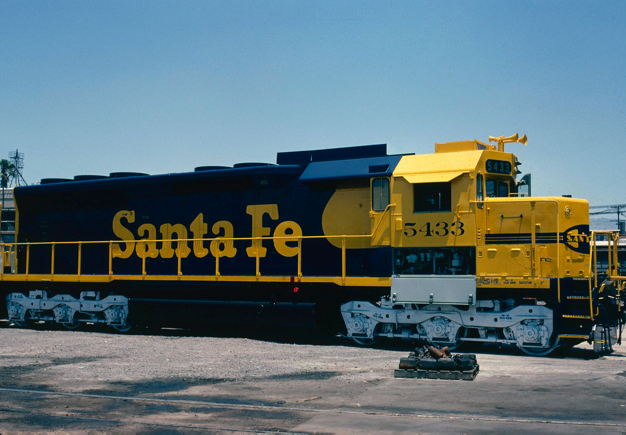 Atchison, Topeka & Santa Fe's only three Fairbanks-Morse Erie-Builts lead  lead train 101, the Centennial State, out of Denver with 7 cars at 30 MPH  in 1951. The poor reliability of the